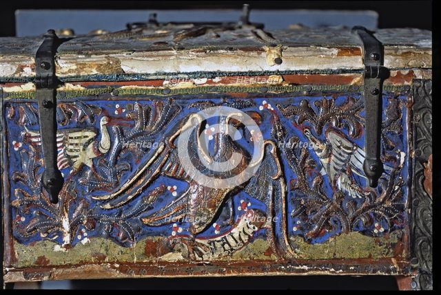 Detail of a chest made in painted wood, decorated with an eagle with two white birds in polychrom…