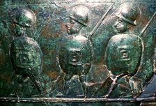 Detail of a bronze situala with Etruscan soldiers, 5th century BC