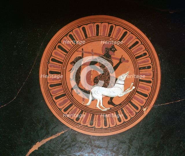 Detail of a Greek kylix showing a hunter and his dog. Artist: Unknown