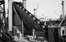 Detail of a dredger at work in Tilbury Docks, Essex, c1945-c1965. Artist: SW Rawlings