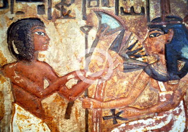 Detail of a familiar stele in a worship chapel.