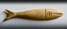 Detail of a fish-shaped bone gaming piece from Portchester Castle, Fareham, Hampshire, 2009. Creator: Derek Kendall