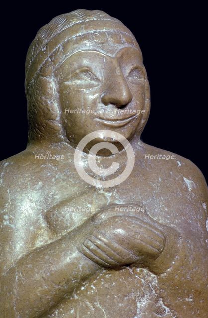 Detail of a limestone statue of a woman, about 2500 BC, from Tello (ancient Girsu),Southern Iraq. Artist: Unknown