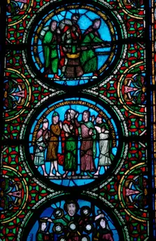 Detail of a stained glass window in St Denis, France, 12th century