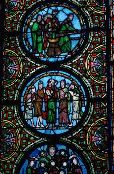 Detail of a stained glass window in St Denis, France, 12th century