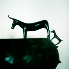 Detail of Celtic bronze bowl showing a cow and calf, Hallstatt, Austria, 6th century BC