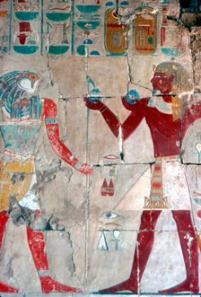 Detail of painted relief of Tuthmosis III before Horus, Temple of Hatshepsut, Luxor, 15th centuryBC