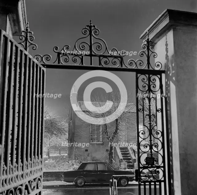 Detail of the wrought iron gate and overthrow at the Old Hall, Highgate, London, 1967. Creator: John Gay.