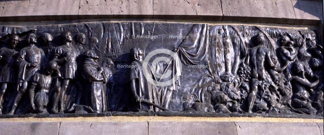 Detail of the bas-relief in the monument to Christopher Columbus in Barcelona, allegorical scene …