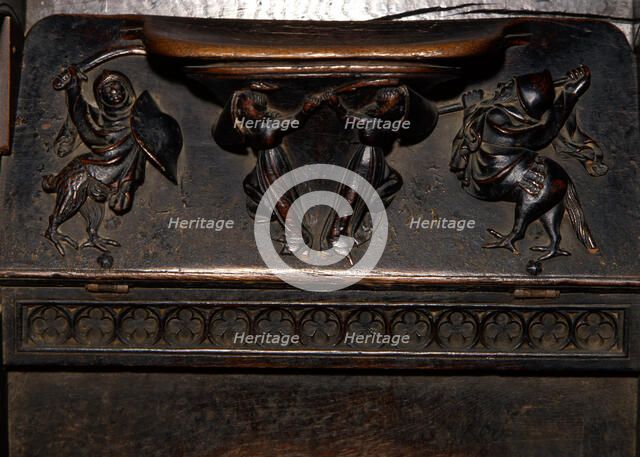 Detail of the choir ashlar work of the Cathedral of Barcelona, made in oak wood, 'Reliefs of Mercy'.
