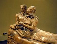 Detail of the figures of an Etruscan sarcophagus of the spouses, made in terracotta