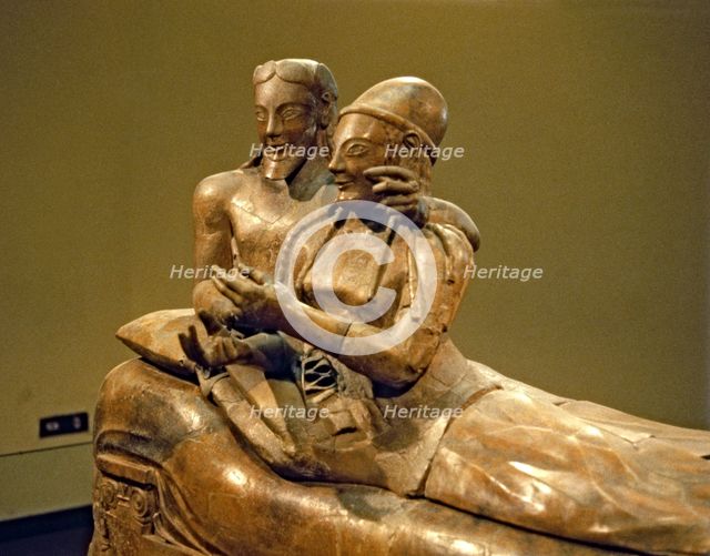 Detail of the figures of an Etruscan sarcophagus of the spouses, made in terracotta.