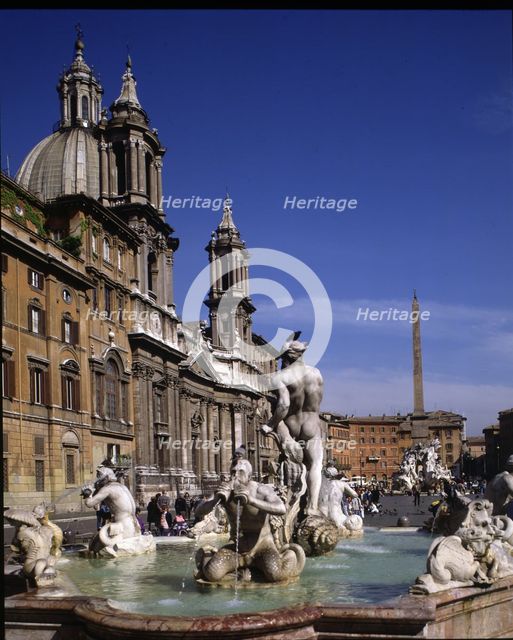 Detail of the Fountain of the Rivers and the Church of St. Agnes, both are Baroque style.