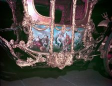 Detail of the Gold State Coach at the time of the coronation of Queen Elizabeth II, 1953. Creator: Arthur Charles Kirby Ware
