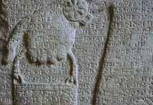 Detail of the hand on a relief of an Assyrian genie