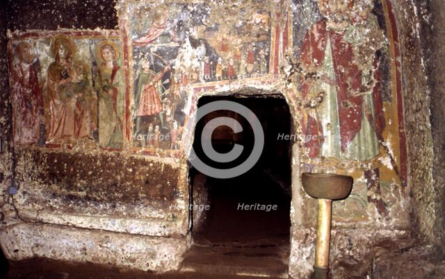 Detail of the interior of the sanctum of Mitreo and the mural paintings subsequently painted on t…