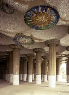 Detail of the roof of the forest of columns that support the great square of Guell Park, designed…