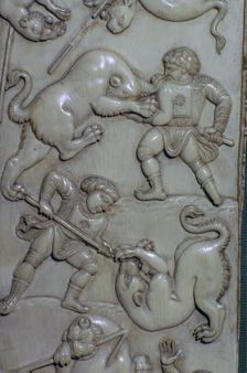 Detail from an ivory diptych of men fighting lions, 6th century