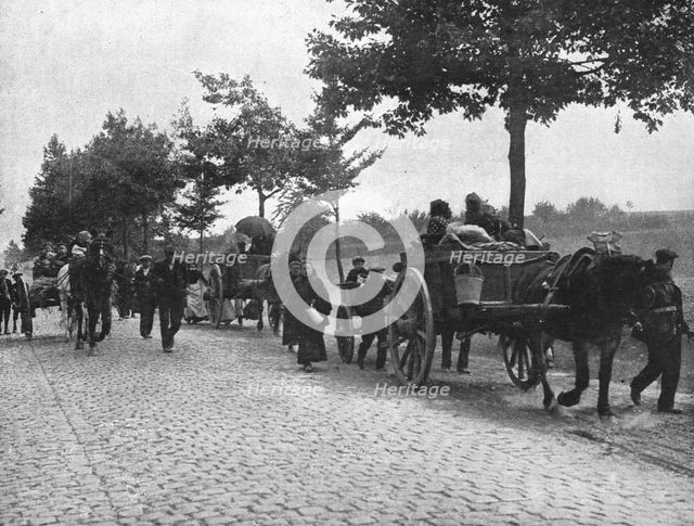 'Devant l'envahisseur; Les habitants des campagnes belges fuient sur les routes', 1914. Creator: Unknown.