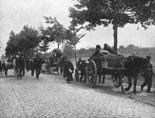 Devant l'envahisseur; Les habitants des campagnes belges fuient sur les routes 1914. Creator: Unknown