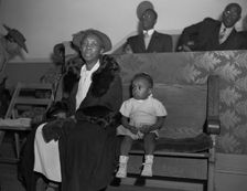 Deacons corner in the Church of God in Christ, Washington, D.C., 1942. Creator: Gordon Parks