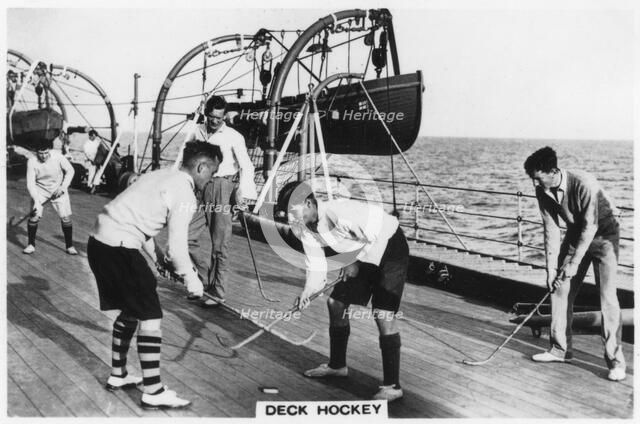 Deck hockey on board the battleship HMS 'Nelson', 1937. Artist: Unknown