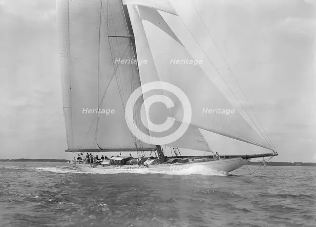 Deck of the 23-metre cutter 'Astra' sailing close-hauled, 1933. Creator: Kirk & Sons of Cowes.