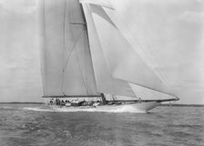 Deck of the 23-metre cutter Astra sailing close-hauled, 1933. Creator: Kirk & Sons of Cowes