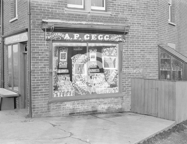 Decorated shop window of AP Gegg, c1935. Creator: Kirk & Sons of Cowes.