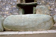 Decorated slab across an entrance to a passage grave, 33rd century BC