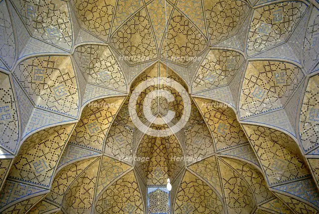 Decorative muqarnas vaulting in the Iwan entrance, Jameh (Friday) Mosque, Isfahan, Iran, 2000. Creator: Unknown.