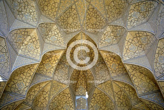 Decorative muqarnas vaulting in the Iwan entrance, Jameh (Friday) Mosque, Isfahan, Iran, 2000. Creator: Unknown.