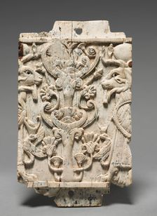 Decorative Plaque: Ram-Headed Sphinxes Flanking a Sacred Tree, 900-800 BC. Creator: Unknown