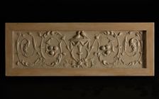 Decorative relief: Two doves on urn with scrolling vines at either side. Creator: Unknown