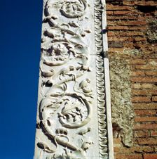 Decoration on the jamb of the dooway of the Building of Eumachia in the Forum, Pompeii, Italy. Creator: Unknown