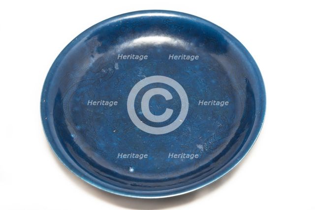 Deep blue dish with carved dragon design, 1522-1566. Creator: Unknown.