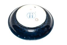 Deep blue dish with carved dragon design, 1522-1566