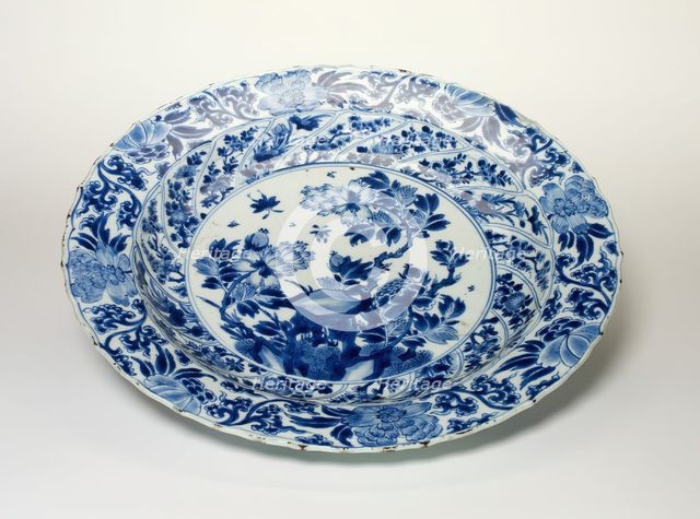 Deep Dish with Peony, Pine Branches, Plum Blossoms, Chrysanthemum..., Qing dynasty, 19th cent. Creator: Unknown.