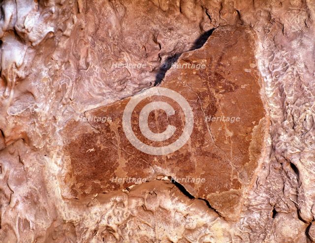 Deer lying on the right, Painted in red with spot colors. 37cms. Levantine Art, from the Canyon o…