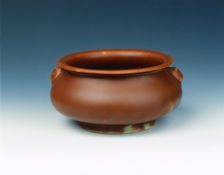 Dehua rust red censer with lion-head masks, late Ming dynasty, China, 1600-1644