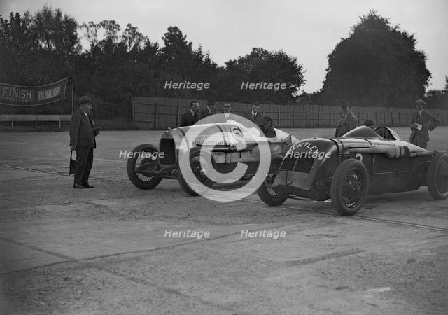 Delage of J Taylor and Bentley of Dudley Froy, Surbiton Motor Club race meeting, Brooklands, 1928. Artist: Bill Brunell.