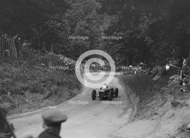 Delage of JC Davis competing in the MAC Shelsley Walsh Hill Climb, Worcestershire, 1932. Artist: Bill Brunell.