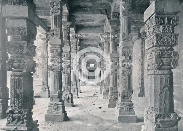 'Delhi. Corridor of Hindu Pillars in Kutub Mosque', c1910. Creator: Unknown.