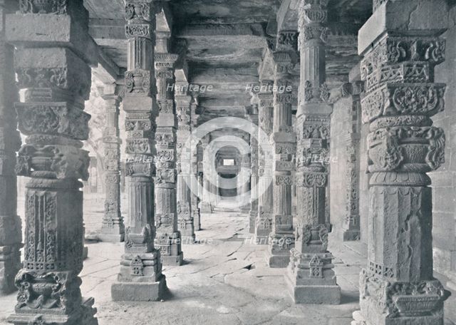 'Delhi. Corridor of Hindu Pillars in Kutub Mosque', c1910. Creator: Unknown.