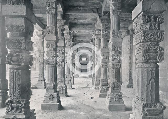 'Delhi. Corridor of Hindu Pillars in Kutub Mosque', c1910. Creator: Unknown.