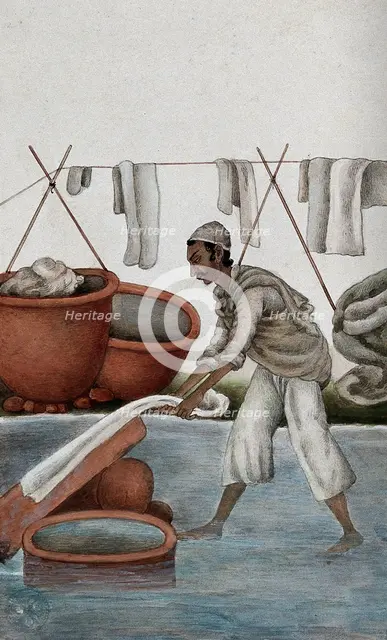 Delhi: a washerman washing clothes, (between 1800 and 1899?). Creator: Unknown.