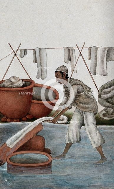 Delhi: a washerman washing clothes, (between 1800 and 1899?). Creator: Unknown.