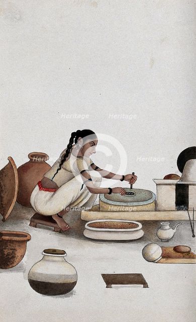 Delhi: a woman grinding grain into flour, (between 1800 and 1899?). Creator: Unknown.