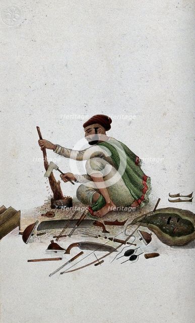 Delhi: a carpenter chipping at wood, (between 1800 and 1899?). Creator: Unknown.