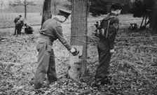 Demonstration of how to place limpet mines, c1943. Creator: British Government